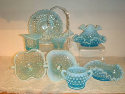 Nine FENTON Glass Blue Opalescent Hobnail Pieces:: Nine FENTON Glass Blue Opalescent Hobnail Pieces: Includes 2 1/4"T Hat, 6 1/4"T Basket, 2"T Mini Sugar Bowl, 3"T Mini Vase, Pair of Handled Bonbons, 6" Tri, Double Crimped and Plate Bonbons. 