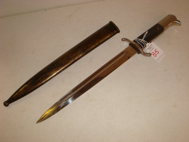 MAUSER Bayonet Style Eagle Headed SOLINGEN Knife:: MAUSER Bayonet Style Eagle Headed SOLINGEN Knife: Metal Scabbard with Frog, Eagle Head Pommel, Black Composition Grips and S Guard. 14" LOL and 9 5/8" Blade. Deep Blood Groove. (100-150)