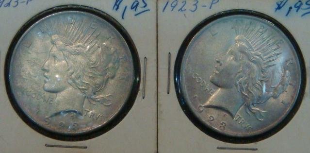 Two PEACE US SILVER DOLLAR; Both 1923:: Two PEACE US SILVER DOLLAR; Both 1923: Both AU55 Condition. 90% Pure Silver. Both in Paper and Cellophane Fold over Holders (70-150)