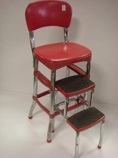 Red Retro Look COSCO Step Stool Chair:: Red Retro Look COSCO Step Stool Chair: 2 Slide out Retractable Steps with Rubber Treads. Padded Vinyl Seat and Back. Steel Frame with Chrome Finish. 29"T at Seat, 34"T at Back. (50-100)