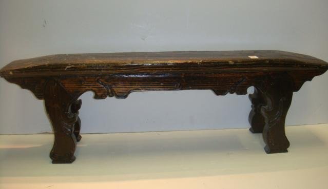 Hand Hewn Painted Pine Bench with Through Tenons:: Hand Hewn Painted Pine Bench with Through Tenons: Low Bench with Two Carved Legs Each End with Fan Design and Bar Brace Between. Carved Apron. Brown/Black Finish. 13"T X 41" W X 7"D. (80-160)