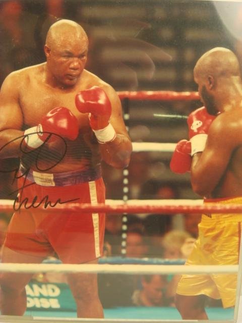 Autographed GEORGE FOREMAN Photograph:: Autographed GEORGE FOREMAN Photograph: George Edward Foreman; 1949-, Marshall, Tx. Nicknamed "Big George", Heavyweight Boxer. Color 8 X 10 Glossy Signed Photo in Black Marker. (30-75)