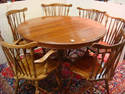 THOMASVILLE Round Cherry Dining Table and 6 Chairs:: THOMASVILLE Round Cherry Dining Table and 6 Chairs: Table is 4' X 30"T with 2 12" Leaves. Chairs 34"T at Back. Beveled Edge, 3"W Apron on Basoform Center Pedestal with 4 Shaped Legs. 6 Windsor Brace