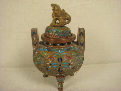 Asian Covered Bronze Champlevé With Foo Dog Finial:: Asian Covered Bronze Champlevé With Foo Dog Finial: Small Domed Lid W/Foo Dog On Round Body. Raised on 3 Legs, All Over Enameling of Flowers on Textured Ground w/Geometric Handles. Jeweling on Legs.