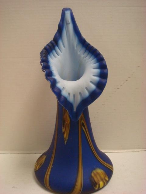 AZERBEJAN Russian Art Glass Jack in Pulpit Vase:: AZERBEJAN Russian Art Glass Jack in Pulpit Vase: White Interior and Blue Exterior with Brown Swirling Pattern. Crimped Top. Foil Label on Bottom. Hairline Fracture at Top. (100-200)