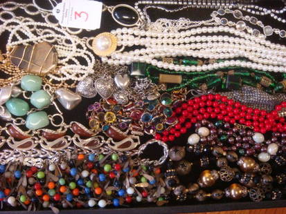 Array of Ladies Costume Jewelry Necklaces.: Array of Ladies Costume Jewelry Necklaces. From Choker to Opera Length. Stone, Mesh, Chains, Pearls, Rhinestones and Beads. 1906 Indian Head Penny Pendant. 17 Plus Pieces. (100-200)