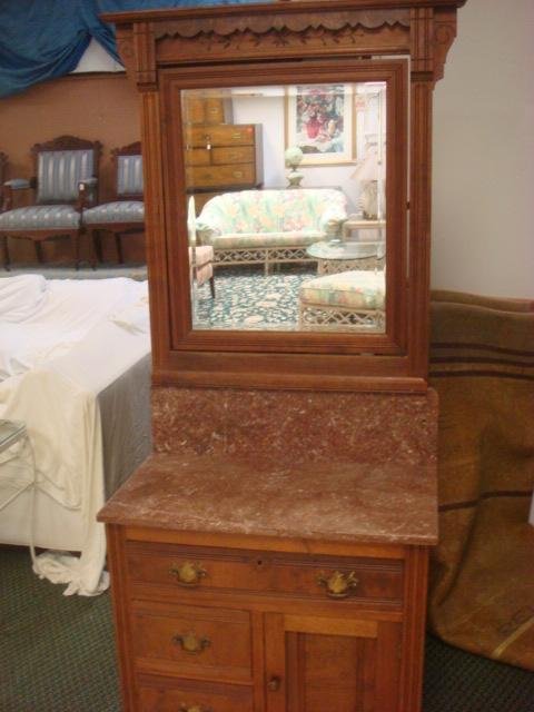 Eastlake Mirrored Marble Top Walnut Washstand:: Eastlake Mirrored Marble Top Walnut Washstand: Ogee Cornice W/Burled Carving Around Tilt Beveled Mirror, Rust Colored Marble Backsplash & Top. Incised Decoration Down Sides, Fronts of 3 Drawers & Cabi