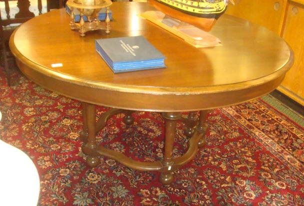 Beveled Edge Round Dining Table:: Beveled Edge Round Dining Table: Quadra foil Stretcher Supporting 6 Block and Bell Turned Legs with Ball Feet. 29"T with 54" Diameter Top. Scratch on Top. (140-240)