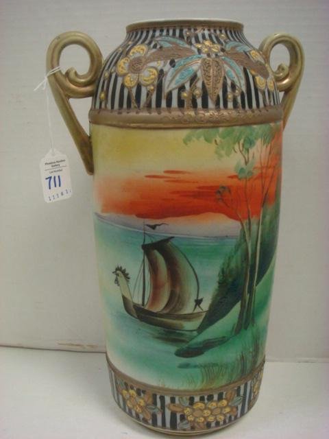 Hand Painted Nippon Style Double Handled Vase:: Hand Painted Nippon Style Double Handled Vase: Rooster Sailboat on Green Sea on Front. Applied Gold Curls Handles, Top and Base Raised Floral over Black Stripes. 14 1/2"T (100-200)