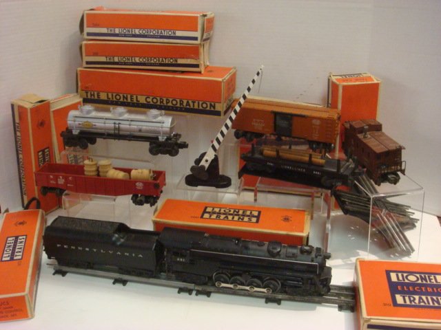 O Gage 1950's LIONEL Train Set:: O Gage 1950's LIONEL Train Set: Includes Locomotive 681 with Tender 2671W with Whistle, New York Central Long Red Gondola 6462 with 4 Unstained Barrels, Operational Log Dump Car 3461 with Log Loader 3