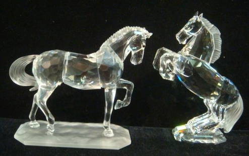 Pair of SWAROVSKI Lipizzaner Stallions:: Pair of SWAROVSKI Lipizzaner Stallions: Famous for the Austrian Dressage Team. Clear and Frosted Crystal. One Rearing up, other Standing in Salute Position. Tallest is 4 1/4"T. Original Boxes 