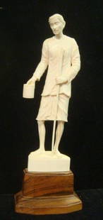 Carved Pre-ban Ivory Figurine of Blind Street Beggar:: Carved Pre-ban Ivory Figurine of Blind Street Beggar: Original Sticker "Government of Kerala, Dept. of I&C" Finely Detailed Figurine of Man with Cup and Stick Mounted on Wooded Plinth. 9" Tall. Ivory