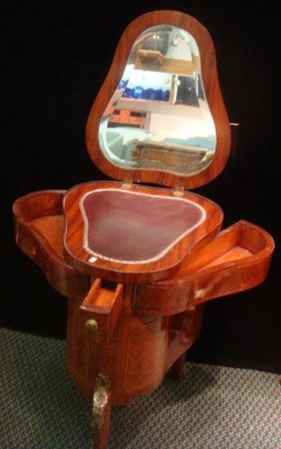 Unusual Louis XV Style Pear Shaped Butterfly Vanity:: Unusual Louis XV Style Pear Shaped Butterfly Vanity: Top Lifts to Expose Beveled Mirror and Faux Leather Interior Surface. Narrow Front Drawer Pulls Out Causing 2 Side Wing Compartments to Swing Out. 