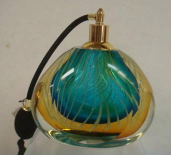 Large Murano Glass Perfume Bottle with Atomizer:: Large Murano Glass Perfume Bottle with Atomizer: White Lines Surround Aqua Interior with Amber then Clear Exterior. Original Tag. Exclusively Produced by Home Essentials and Beyond. 6"T, 5 3/4"W. 