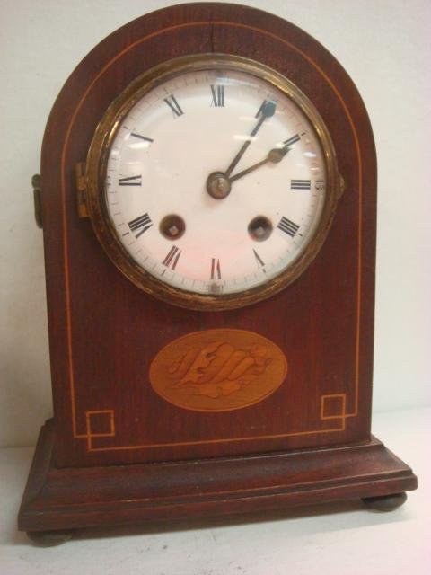8 Day Strike and Time Wood Cased Mantle Clock:: 8 Day Strike and Time Wood Cased Mantle Clock: Stained and Painted Front Design. With Key and Pendulum. 10" x 8" x 5" (100-200)