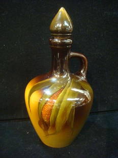 ROOKWOOD Corn Jug Ca 1898:: ROOKWOOD Corn Jug Ca 1898: Standard Glaze. Corn Cob on Brown and Butterscotch Ground. Artist Initials LA for Lenore Asbury. Flame Marked for 1898. Impressed 673. Original Stopper. 9 1/2"T. (500-1000)