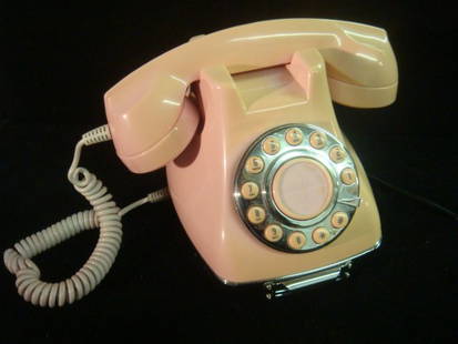 Pink Flash Dial Metro Phone: Made by GK United, Circa: Pink Flash Dial Metro Phone: Made by GK United, Circa 1960's. Polyflame Concept with Push Button Numbers on Faux Rotary Dial. Pull Out Drawer with Notepad at Bottom for Messages. Adjustable Ringtone,