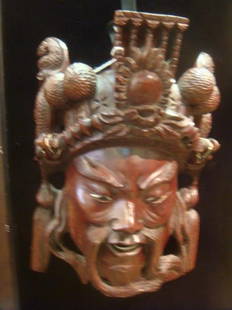 Handcarved Rosewood Chinese Emperor Mask: Highly: Handcarved Rosewood Chinese Emperor Mask: Highly Decorated with Bone Teeth and the Sclera Part of the Eye. Detailed Dragons on he Sides of Headdress Also Have Bone Teeth and Eyes. Elongated Tassels