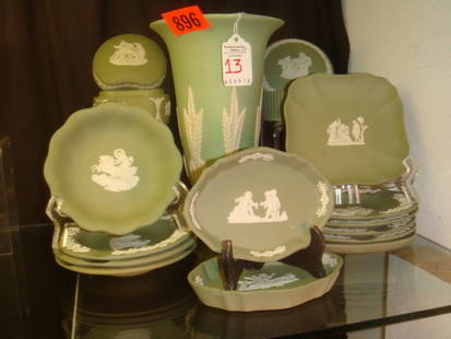 WEDGWOOD and ECANADA Green Jasperware: 15 Pcs. Inc. 7-: WEDGWOOD and ECANADA Green Jasperware: 15 Pcs. Inc. 7- 4 1/2" Ashtrays; 4 3/8" Scallop Dish, 2- 4 1/4" Sq. Dishes, 2- 4 1/2" Oval Dishes; 2 Lidded Boxes & Ecanada 8"T Trumpet Vase. (100-300)