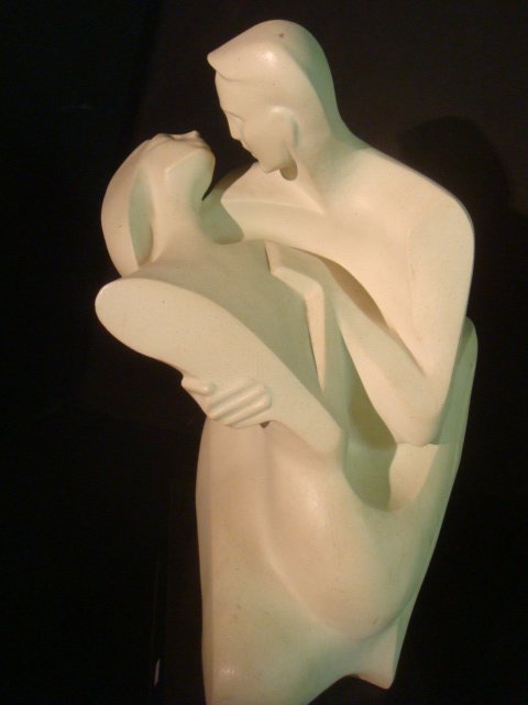 DANST "THE EMBRACE" Austin Productions 1990 Sculpture:: DANST "THE EMBRACE" Austin Productions 1990 Sculpture: Cubist Style Romantic Couple in Embrace. Durastone. 20" x 14" x 14" on 2" Black Plinth. Very Good Condition. (150-250)