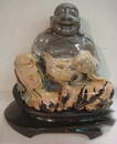 Carved Jasper Buddha on Granite Base: Expertly Carved