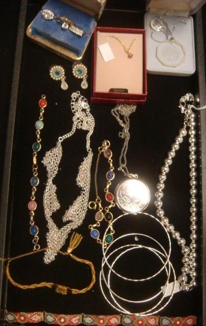 Sterling & Costume Jewelry: 2 Sterling Necklaces, Round: Sterling & Costume Jewelry: 2 Sterling Necklaces, Round Locket, 2 Scarab Bracelets, Mosaic & Navy Emblem on Braided Chain Bracelet, 2 Silvertone Necklaces, 4 Silvertone Necklaces & Bangles. Pr. Monet