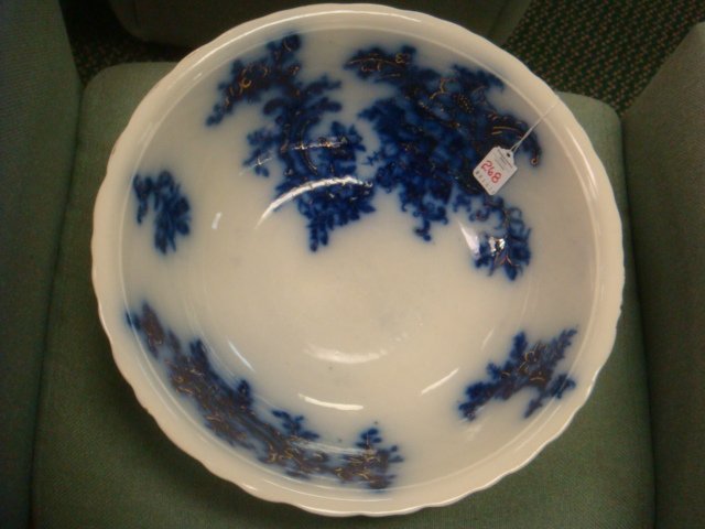 Flow Blue Wash Bowl Marked AM Over L:: Flow Blue Wash Bowl Marked AM Over L: Blue Floral with Gold Accents. Some Gold Wear. Star Crack on Bottom. 15 1/4"D. (40-60)