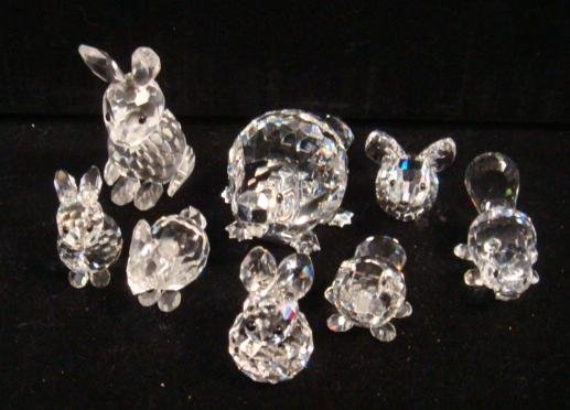 Eight SWAROVSKI Crystal Rabbits and Beavers:: Eight SWAROVSKI Crystal Rabbits and Beavers: Mother Rabbit is 2 1/8"T, 3 Babies are 1" 1 1/16" & 1 1/4"T. Long Eared Bunny is 7/8"T. Mother Beaver is 1 3/8"T, 2 Baby Beavers are 1" and 1 1/8"T. Origin