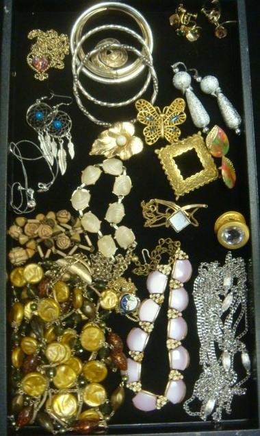 Selection of Ladies Costume Jewelry:: Selection of Ladies Costume Jewelry: 4 Bangle Bracelets, Sarah Coventry Pendant & Pin. Clip and Screwback Earrings. Etched Brass Pin, Dream Catcher Earrings, Shell Necklace and Rose Carved Necklace. (