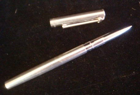 TIFFANY & CO Sterling Silver Tiffany Clip Pen:: TIFFANY & CO Sterling Silver Tiffany Clip Pen: Ca 1980's. Uses Rollerball Cartridge. Marked at Base of Clip Tiffany & Co Sterling 925. (60-80)