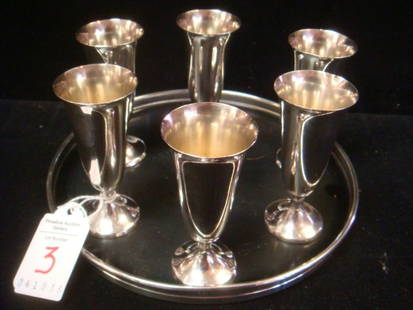 GORHAM Sterling Trivet/Tray with Six Cordials:: GORHAM Sterling Trivet/Tray with Six Cordials: Ca 1950's. Trivet/Tray with Sterling Rim and Black Coated Plastic is 6 1/2"D. Six 3"T Footed Sterling Cordials. (100-200)
