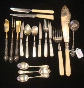 Seventeen Pieces of Assorted Antique Flatware:: Seventeen Pieces of Assorted Antique Flatware: Three Fish Knives and Fork with Mother of Pear Handles have Sterling Collars. Two Mother of Pearl Handled, Engraved Spoons, One Marked EPNS. 800 Silver