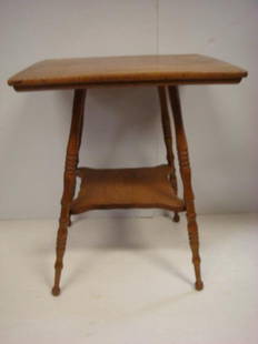 Oak Two Tiered Fern Table:: Oak Two Tiered Fern Table: Shaped Lower Tier with 4 Splayed Ring and Standard Balluster Turned Legs. 23 1/2" Square Top, Shaped Mid-Shelf. 29"T. (80-150)