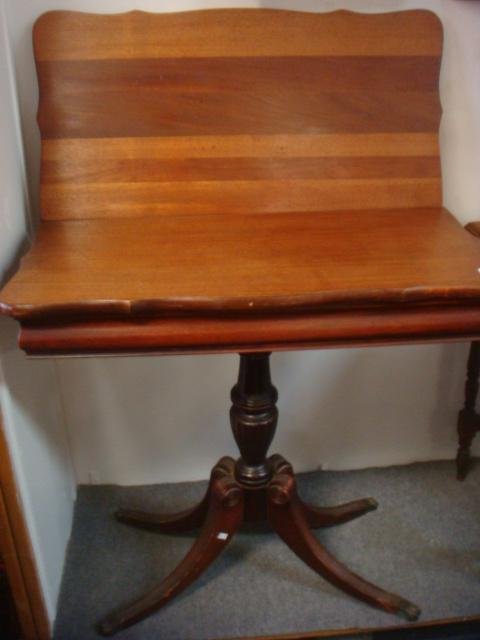 BRANDT DUNCAN PHYFE Revival Mahogany Game Table:: BRANDT DUNCAN PHYFE Revival Mahogany Game Table: Folding Square Bracket Edged Top with Ogee Shaped Apron. It Sits on Turned Pedestal Base w/4 Splayed & Reeded Legs Ending in Metal Paw Feet. It Measure