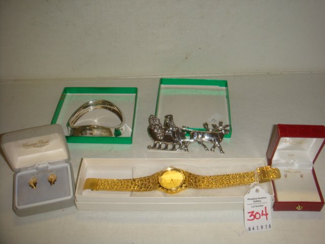 2 Pair 14K Earrings, Silver Bangle & Ornament & Watch:: 2 Pair 14K Earrings, Silver Bangle & Ornament & Watch: First Pr. By Carriage Court is A Leaf Design. Second is 1/8 Diamond Earrings Both Pierced Ears. RLM (Robert Lee Morris) Studio Bangle, Made to Re