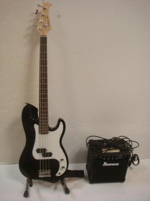CENTURY STAR Electric Bass Guitar and IBANEZ Amp:: CENTURY STAR Electric Bass Guitar and IBANEZ Amp: Beginners Guitar, Basswood Body, Maple on Back, Sides & Neck. Rosewood Fingerboard, Color is Black w/White Panel. Double Cut-Out Body Style. Made in C