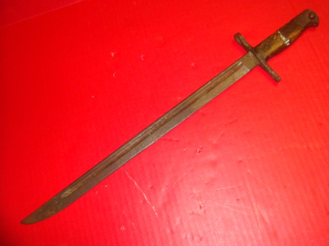 MAUSER Style Long Bayonet with Wooden Handle:: MAUSER Style Long Bayonet with Wooden Handle: 15 1/2" Blade with Long Blood Groove. Wooden Handle with Mauser Style Eagle Pommel. Fair Condition. (50-150)