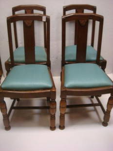 Four Arts and Crafts Oak Side Chairs:: Four Arts and Crafts Oak Side Chairs: Straight Lines with Shaped Crest Rail. Vertical 3" Wide Splat with Applied Contrasting Floral Medallion. Turned Front Legs, H-Stretcher. 36" to Back. Estate