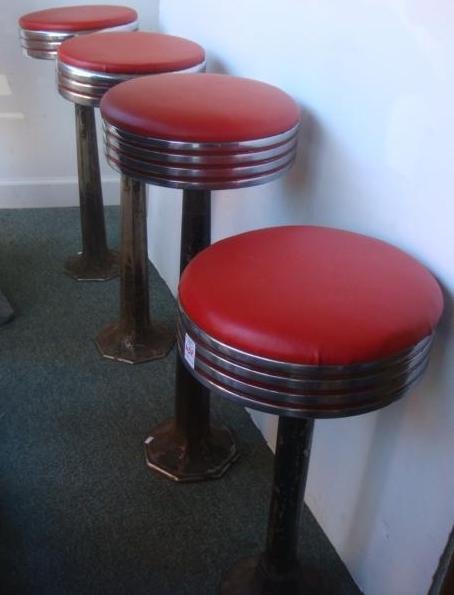 Four Ice Cream Parlor Vinyl & Chrome Bar Stools,: Four Ice Cream Parlor Vinyl & Chrome Bar Stools, Short one for Tall Silent Type and Three Tall ones For the Hooper Triplets, they always Share. Red Vinyl Seats, CA 1950's. Manufactured by the DURO CHR