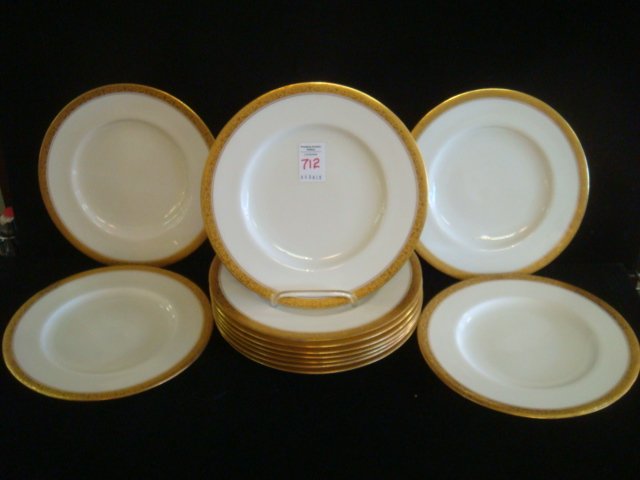 Dozen ROYAL WORCESTER Gold Banded Luncheon Plates:: Dozen ROYAL WORCESTER Gold Banded Luncheon Plates: Chancellor Pattern, Now Discontinued. Ca 1918. 8 7/8"D. Embossed Gold Band on Ivory Ground. (140-240)