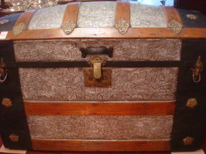 19th C. Fancy Dome Top Trunk with Pressed Tin:: 19th C. Fancy Dome Top Trunk with Pressed Tin: Oak Strapped TRunk, Brass Floral Fasteners. Floral; and Foliate Embossed Tin on 4 Sides and Domed Top. Pine Interior. Hand Forged Nails. Handles