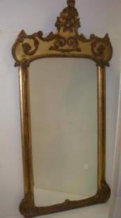 Grand Italian Baroque Pier Mirror:: Grand Italian Baroque Pier Mirror: Silver & Gilt Frame, Gesso on Wood, Scrolling Foliate at 4 Corners with Center Cresting of Foliate Fan Design. Some Paint & Gesso Loss. Crack at lower Corner.