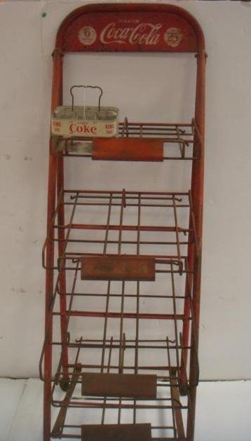 1940's COCA-COLA Rolling Display Rack and 6 Bottle Car: 1940's COCA-COLA Rolling Display Rack and 6 Bottle Carrier: Cal 1949, Red with White Script, "25C a Carton, 6 Bottles Not Iced". 4 Tiered Wire Rack on Casters. 59" X 19 1/2" X 24". Plus Aluminum King 