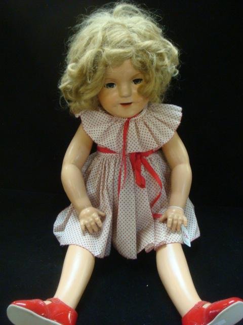 IDEAL 27" COMPO SHIRLEY TEMPLE DOLL CA 1930'S:: IDEAL 27" COMPO SHIRLEY TEMPLE DOLL CA 1930'S: Marked on Head & Back. 4 Joints, Open Mouth w/6 Teeth, Dimpled Cheeks, Brown Glass Sleep Eyes w/Upper Lashes, Painted Brows. Original Wig. Sculptor Berna
