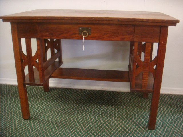 Arts and Crafts Library Table or Desk:: Arts and Crafts Library Table or Desk: Rectangular Top Over Single Center Drawer with Brass Stirrup Pull. Open Bookcase Ends. Front and Back Having Medial Shelf, On Square Legs. 30"T X 42"W X 24"D. 18
