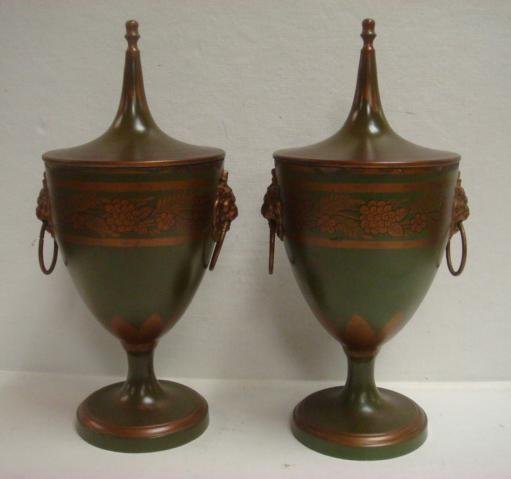 Pair of Regency Tole French Chestnut Urns:: Pair of Regency Tole French Chestnut Urns: Bronze Over Green Ground with Grape and Floral Design on Body and Floral and Leaf Design Continued on Tapered Upswept Lid. Cylindrical Stem Flows onto Round