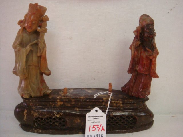 2 Chinese Star God Jade Figures on Lattice Front Base:: 2 Chinese Star God Jade Figures on Lattice Front Base: Fu, God of Prosperity Holds Ru Yi Scepter, One of 8 Treasures. Done in Green/Rust Jade, 4 3/4"T. Shou, God of Longevity, Holds Walking Stick, Don