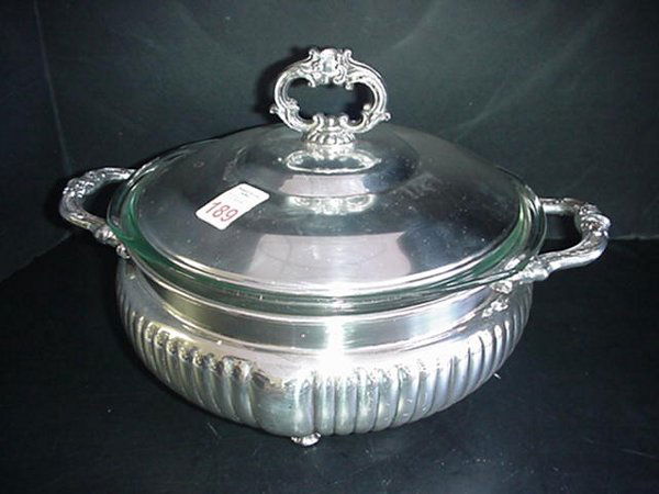 Silverplate Covered Serving Dish with Insert: Silverplate Covered Serving Dish with Insert: 10"T, 11"D. Handled and Footed Serving Dish has Ribbed Sides. 3 Qt. Pyrex Casserole Fits Inside. Silverplate on Copper.