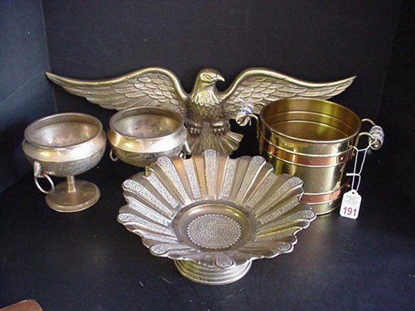 5 Brass Wall and Table Accessories: 5 Brass Wall and Table Accessories: 22"W. Brass Wall Eagle; 5 1/2"T. Round Brass Planter has Copper Bands and Ceramic Handles; 10"D. Brass Footed Bowl with Embossed Design; Two 5"T. Brass Round Footed