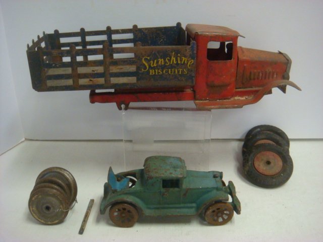METALCRAFT Sunshine Biscuits Truck, Car and Wheels:: METALCRAFT Sunshine Biscuits Truck, Car and Wheels: 9 Pcs.Ca. 1930's, Stake Red Cab, Hood, Fender & Chassis w/Stake Blue Body. Missing Disc Wheels. Played with Condition, 11"L, Some Rust. Cast Iron Ol